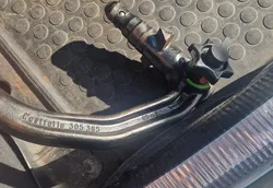 A protective cap for a Westfalia towbar lock