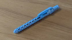 Single piece functional click pen for MJF or SLS