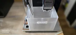 Coffee machine cleaning container