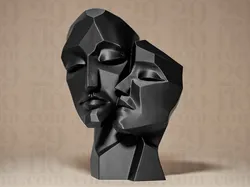 Faces Sculpture