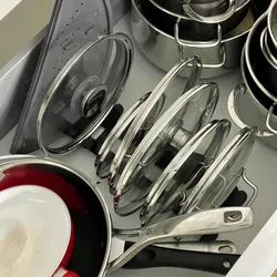 Pluggable pot lid holder
