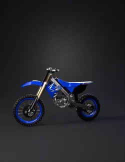 blue dirt bike with knobby tires front suspension and off road frame