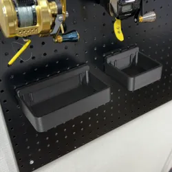 Magnetic storage box for perforated steel panels