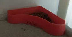 Pet bowl for a corner location