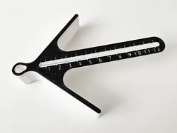 Improved center marker with ruler