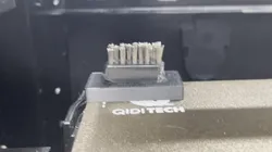 Magnetic Mount for a Nozzle Scrub Brush or Wiper