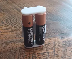 AA batery holder/pack (for traveling)