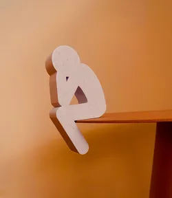Thinking sitting man