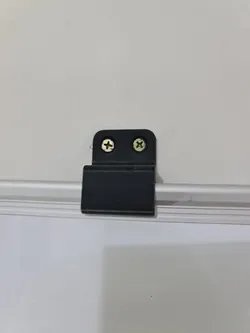 Whiteboard wall mount clip