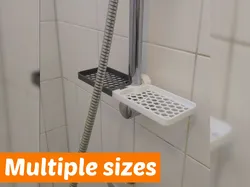 Dual shower shelf