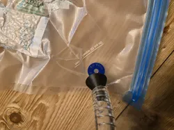 Vacuum adapter for filament bags