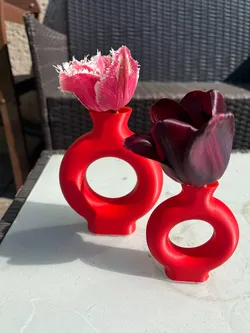 A vase, a flower pot with a futuristic look