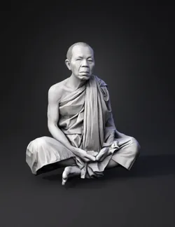 monk in robe seated cross legged meditative posture flowing fabric