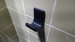 Towel- or cellphone holder/hook with wallmount