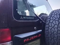 Mitsubishi Pajero Jr rear emblem