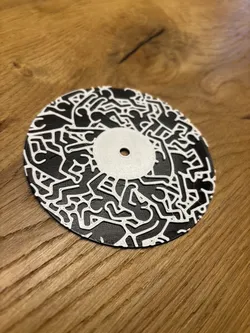 Vinyl record-style coaster inspired by Keith Haring