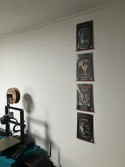 Comic book display shelf with screws holes