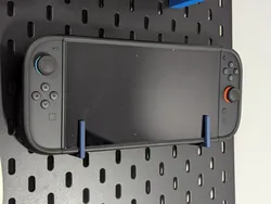 Skadis Hook for Switch 2 with a DBrand case