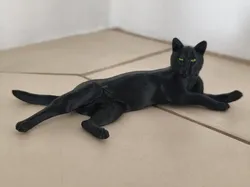 Black cat lying on the floor - Free 3D Print Model
