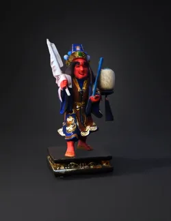 ornate Chinese opera figure statue with blue and gold costume elabora