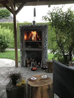 Stainless steel fireplace with rock design for BBQ