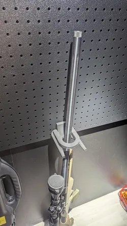 Retaining 25mm pegboard gun stand