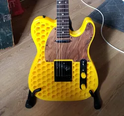 Telecaster guitar with hexagonal holes