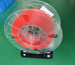 Low resistance low profile filament spool roller base