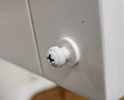 Door catch for plantation shutters