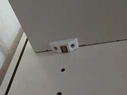 Shelf Board Dowel Retainer