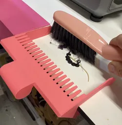 Desk mounted debris Scooper