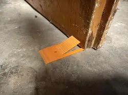Door stop with step