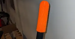 Broom handle with drain hole