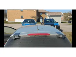 Mobile antenna electric tilt / fold mount