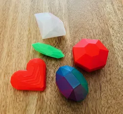 Gems: diamonds, emerald, ruby