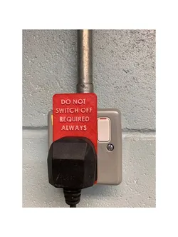 Plug warning sign