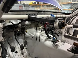 Race car steering column roll cage mount