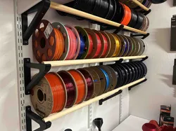 Wall-mounted filament storage system