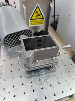 Adjustable table for fiber laser