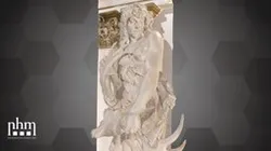 Figure Holding a Giant Deer Skull