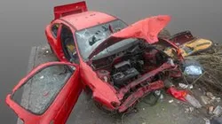 Red car wreck -on demand licence