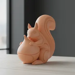 Squirrel with Nut Figurine