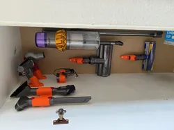 Different Dyson V15 accessories holders
