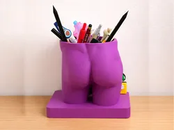 A cheeky male booty pen holder