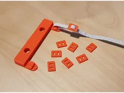 Rubber band adjuster for face mask