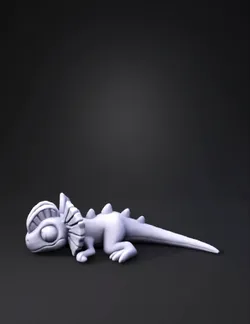 blue dragon figure with cream underside spiky dorsal plates large ey