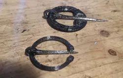 Cloak pins