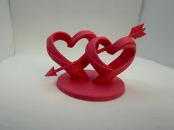 Intertwined Hearts with Arrow Sculpture