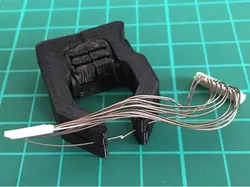 Dual small wire clamp for soldering
