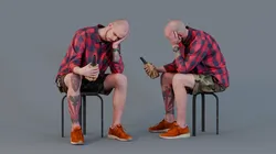 Reflective Moment - Tattooed Man Seated with Drink